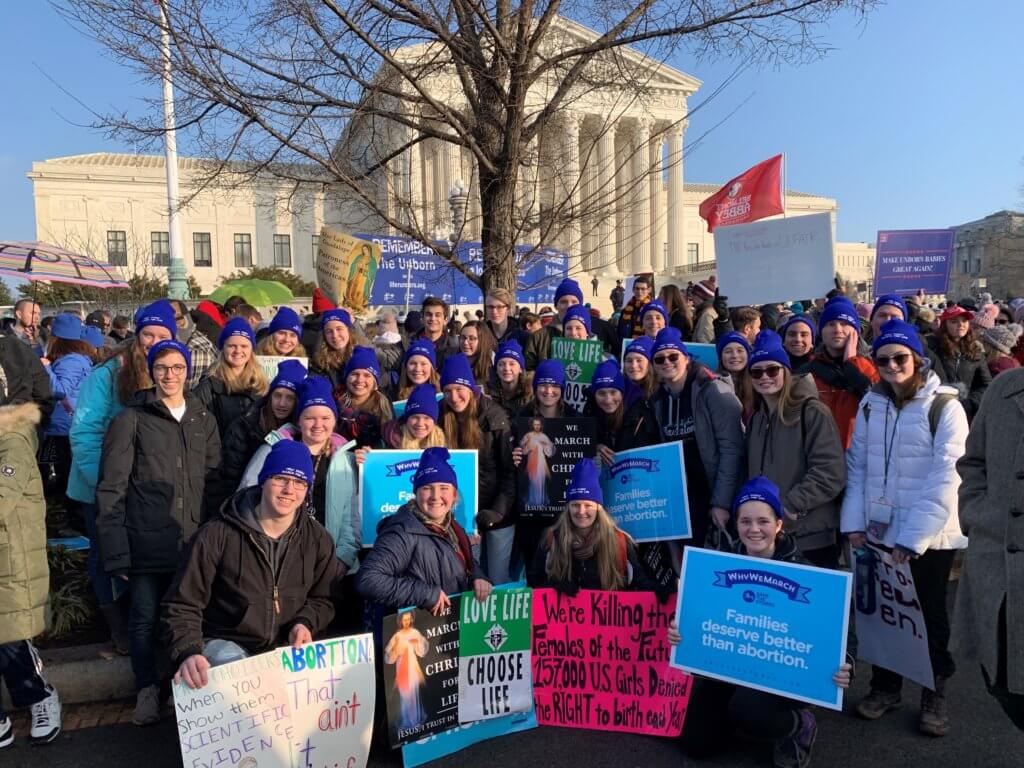 Youth and leaders from Holy Family Parish in Caledonia in front of the Supreme Court building at March for Life 2019