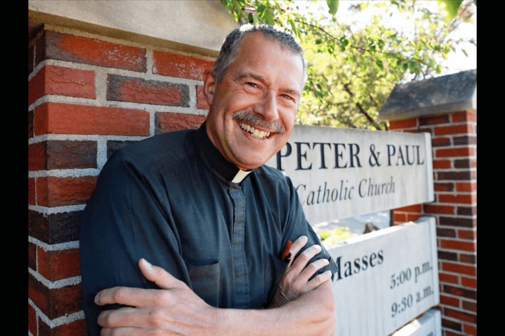 Father Dennis Morrow outside Ss. Peter & Paul Church, photo by Holy Dolci