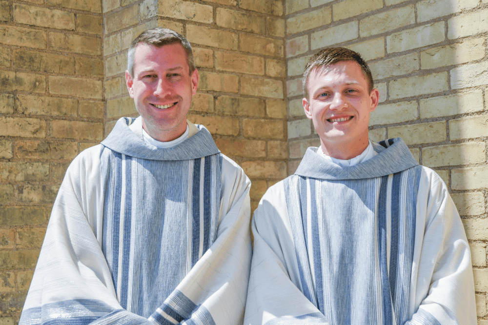 Father Epplett and Father Zemaitis outside the cathedral following Ordination Mass on June 3, 2023 by Jaymie Perry