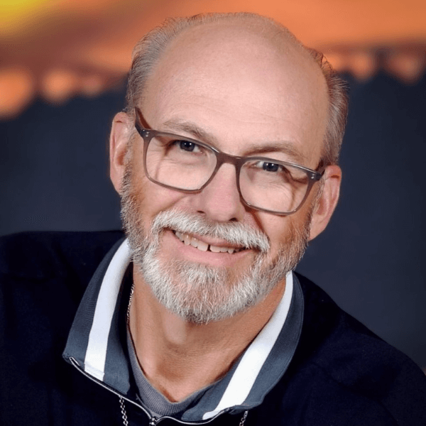 Headshot of Deacon Jene Baughman