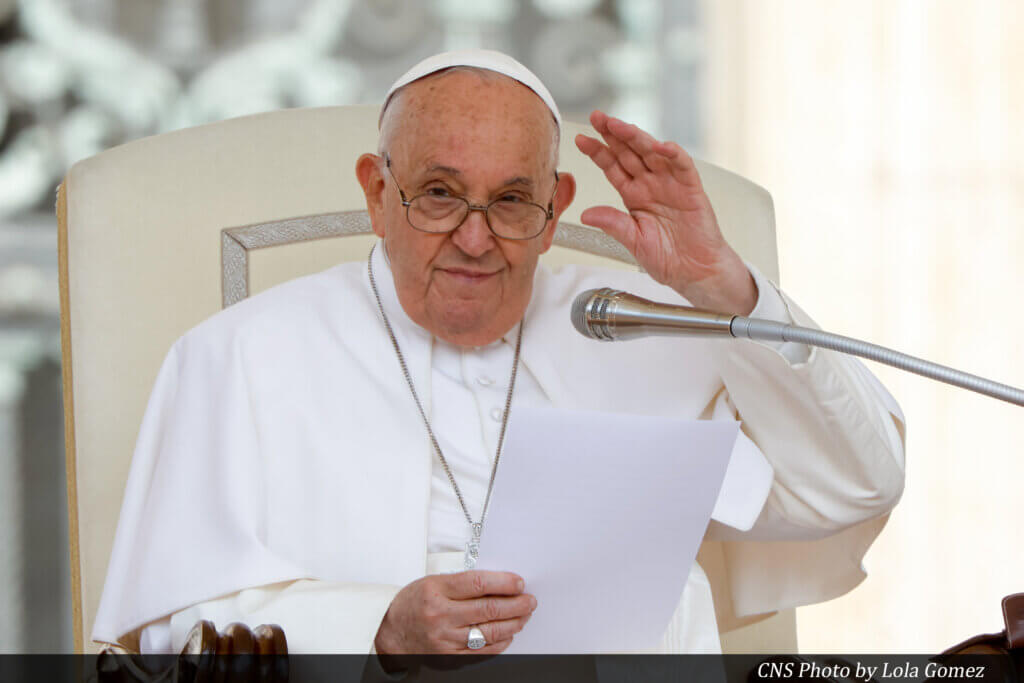 Pope Francis greets visitors at his weekly general audience in St. Peter's Square at the Vatican May 15, 2024. (CNS photo/Lola Gomez)