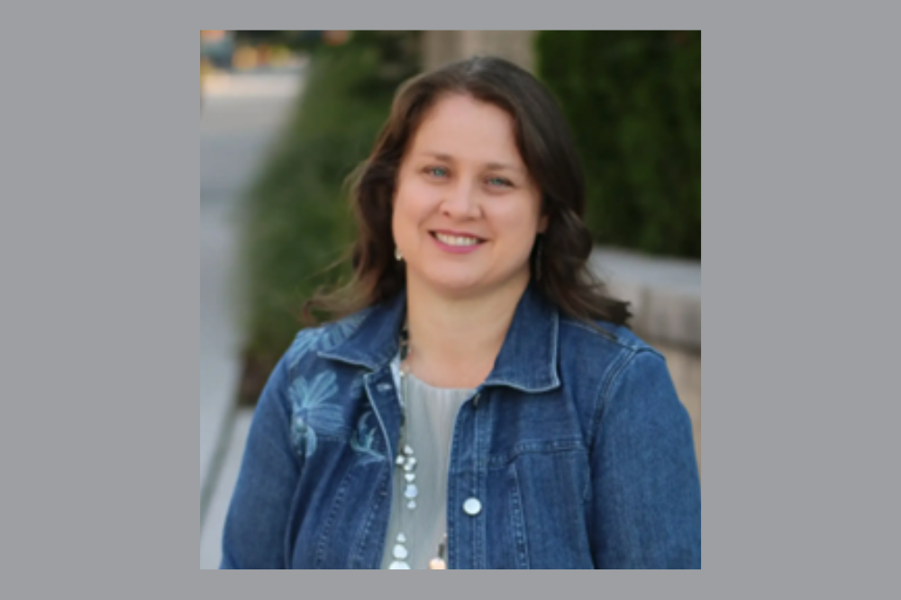 Headshot of Tiffany Marrinan outside of Grand Rapids Catholic Central High School